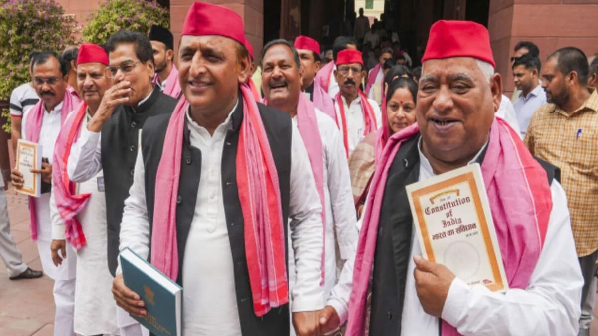 SP leader Akhilesh Yadav and Awadesh Prasad